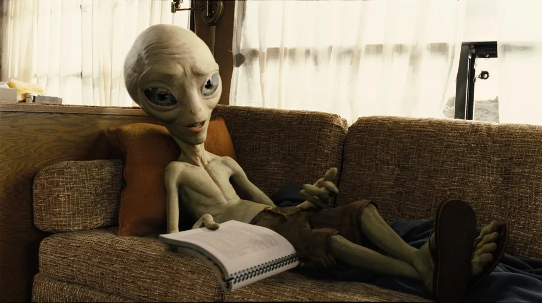 Paul the alien lying on the sofa