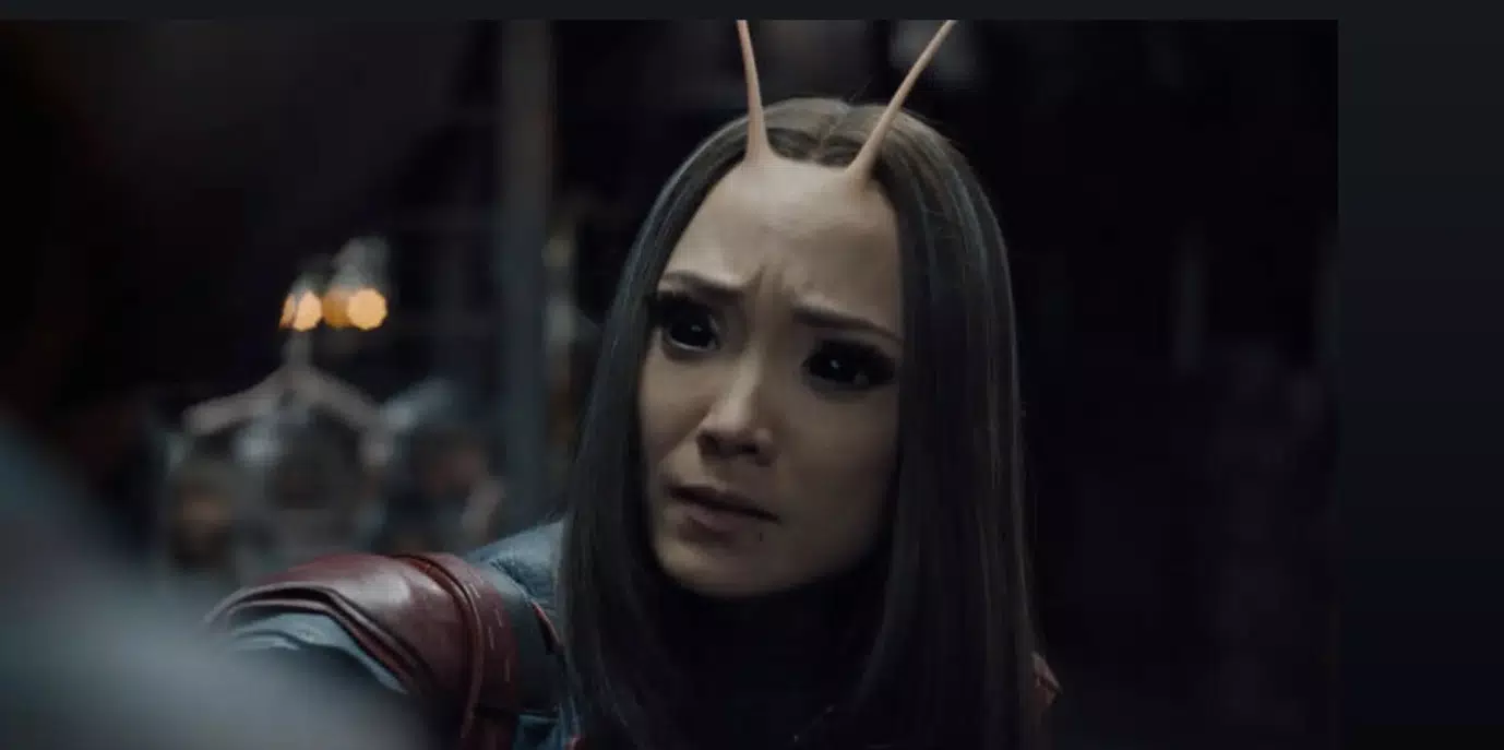 A person with long hair and bunny ears

Description automatically generated