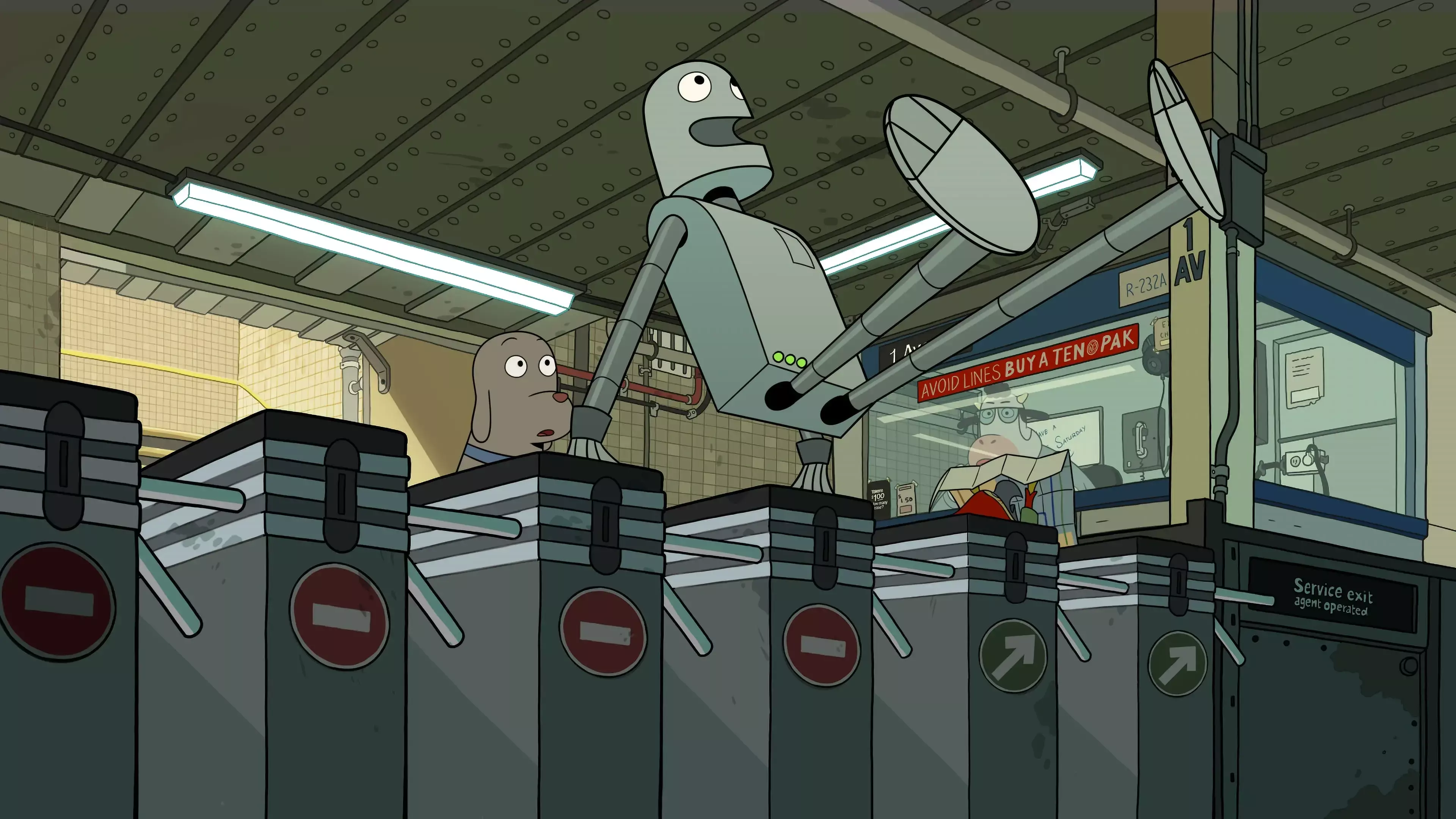 El perro observa cómo su amigo, Robot, salta los molinetes