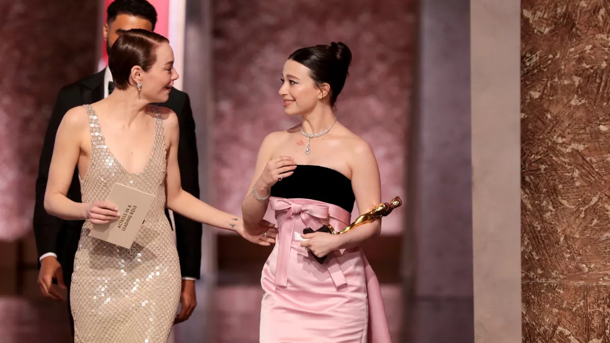 Emma Stone and Mikey Madison at the 97th Academy Awards