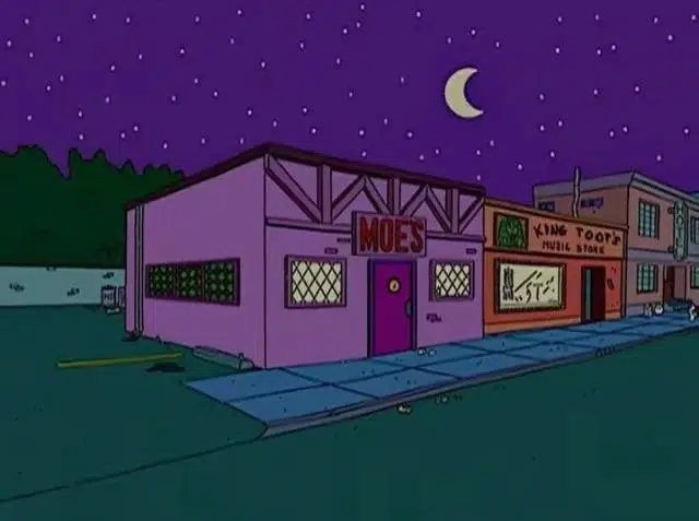 A night establishing shot of Moe's Tavern in The SImpsons