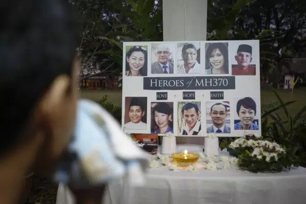 Malaysia approves a new search for missing MH370 plane | AP News