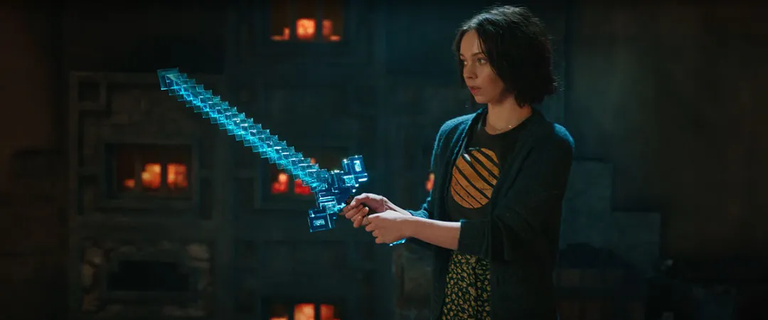 A teenage girl holds a bright blue sword