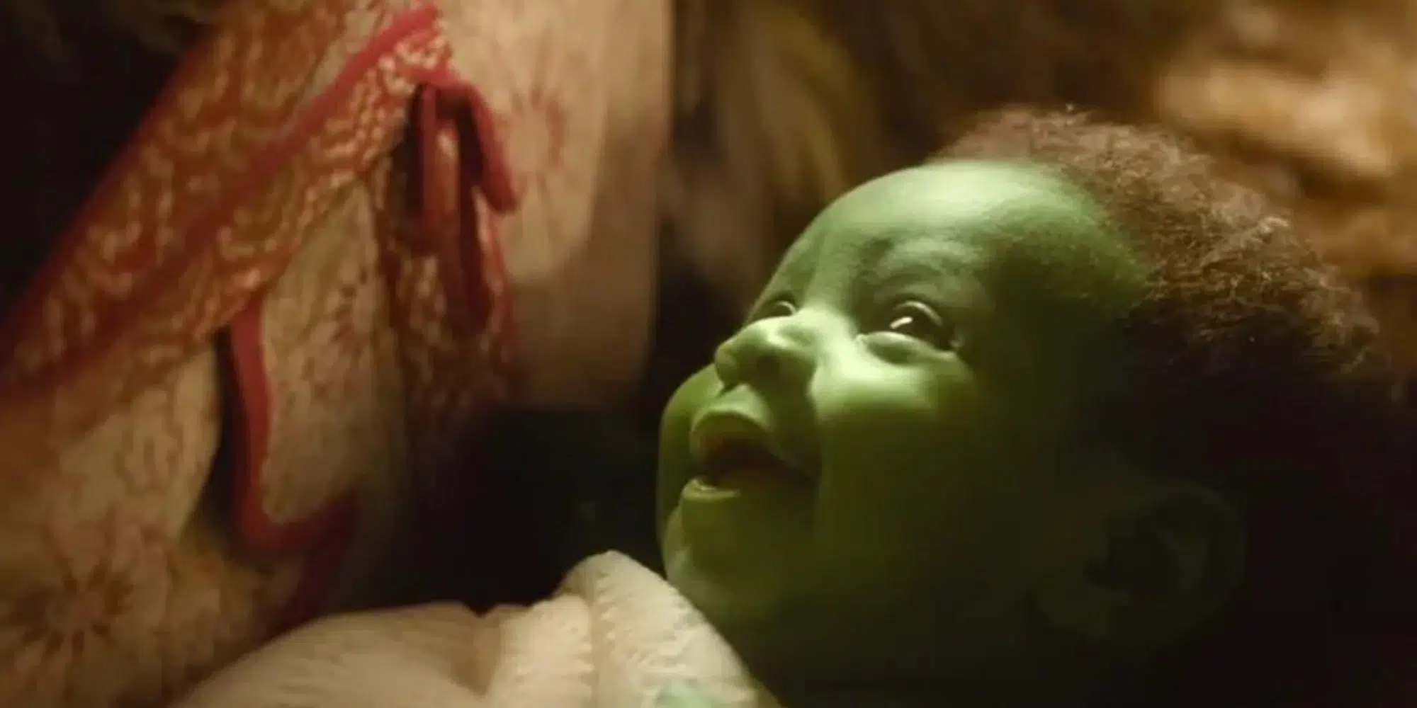In Wicked (2024), the onlookers are shocked by baby Elphaba's appearance.  This is because unlike typical newborns, she is born spotlessly clean,  wrinkle-free, abnornally large, and capable of laughter. :  r/shittymoviedetails
