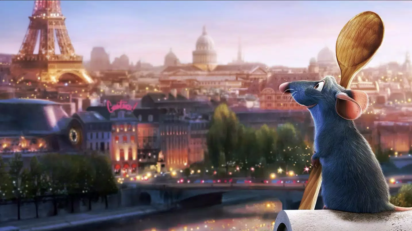An animated rat holding a wooden spoon stares at the Eiffel Tower