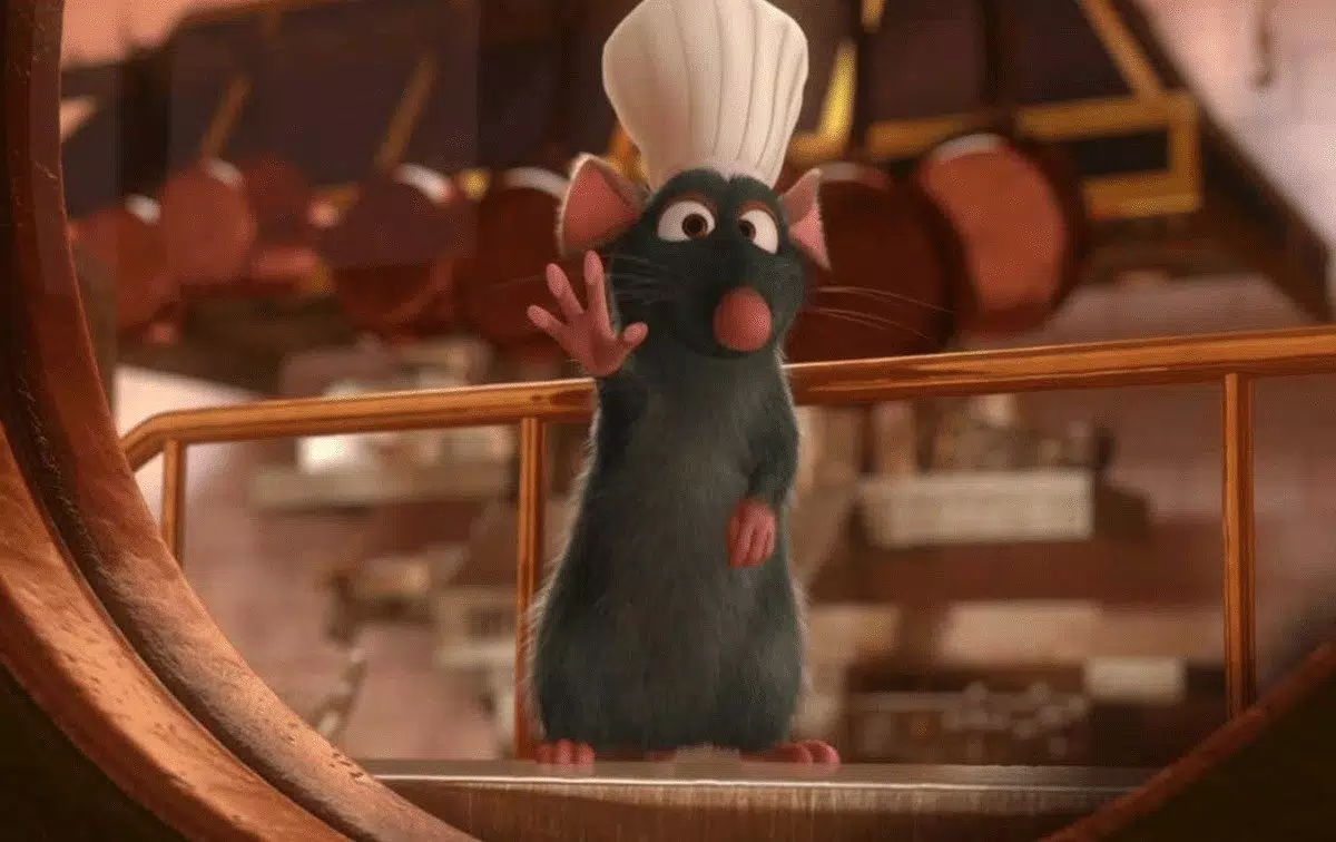 an animated rat wearing a chef's hat