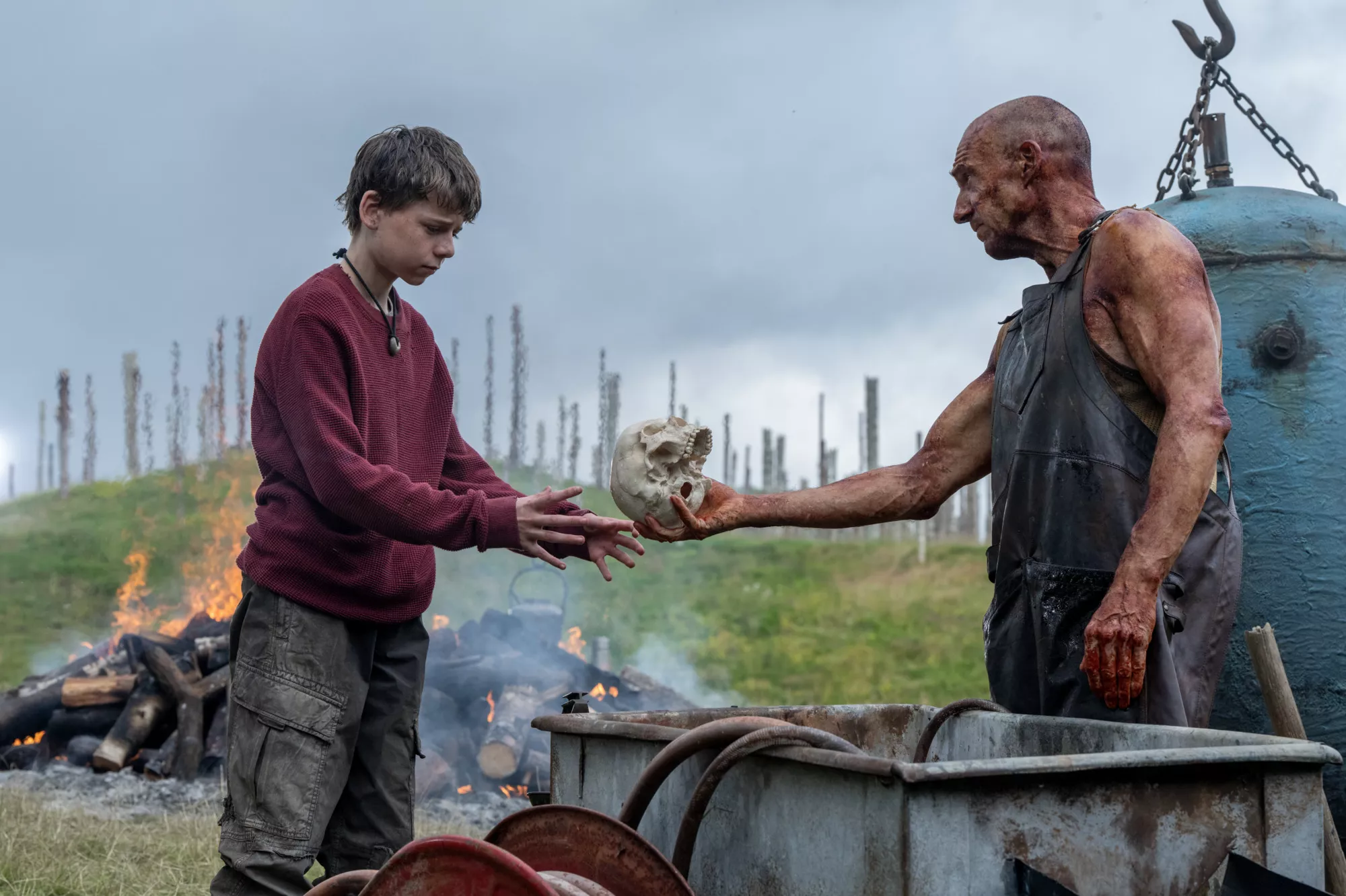 Dr. Kelson (Ralph Fiennes) and Spike (Alfie Williams) in Columbia Pictures' 28 YEARS LATER.