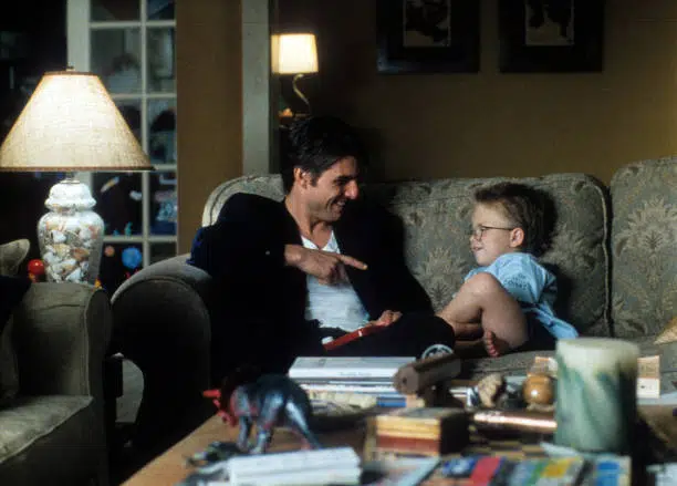 Tom Cruise points to Jonathan Lipnicki in a scene from the film 'Jerry Maguire', 1996.