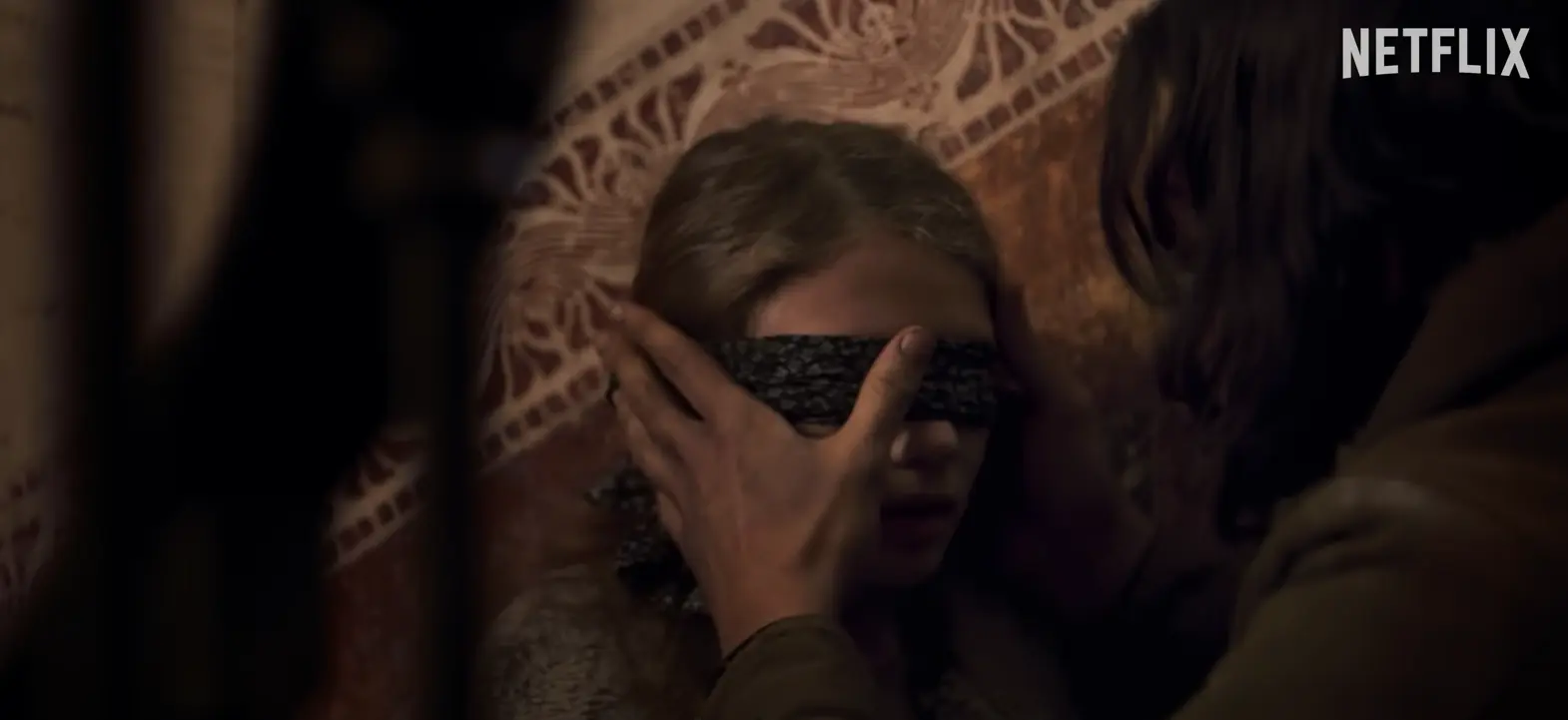 Sebastián blindfolding Sophia