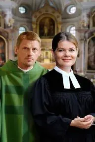 Frau Pfarrer & Herr Priester_peliplat